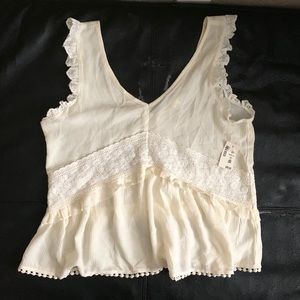 brand new never worn white lace pom trim top